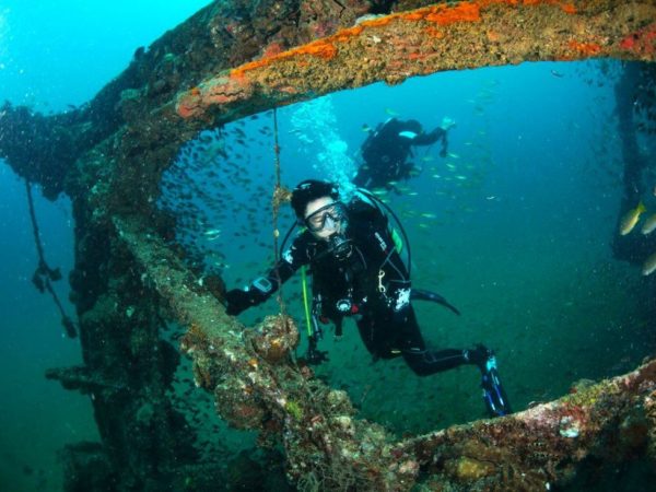 divers on a wreck